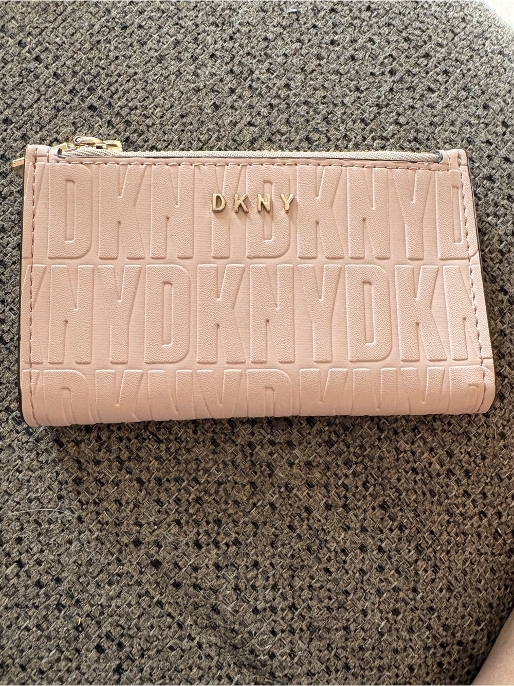 DKNY Embossed Logo Zip Wallet in Blush Pink with Gold Hardware